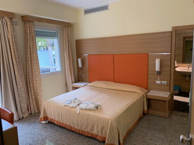 Hotel Villa Doimo Lignano Sabbiadoro Quarto foto