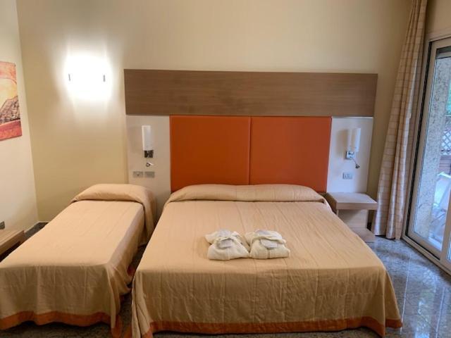 Hotel Villa Doimo Lignano Sabbiadoro Quarto foto