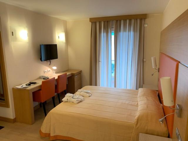 Hotel Villa Doimo Lignano Sabbiadoro Quarto foto
